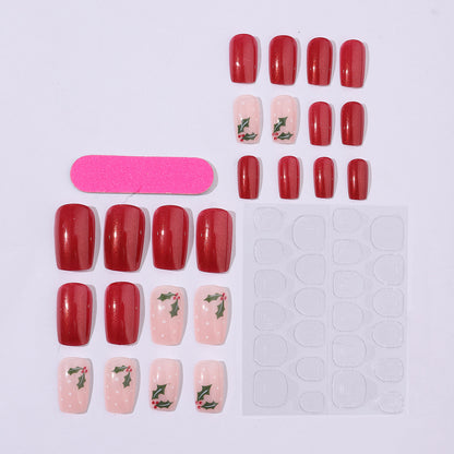 Kunstnagelset mit festlichem Weihnachtsdesign und verspielt festlicher Dekoration Brehn