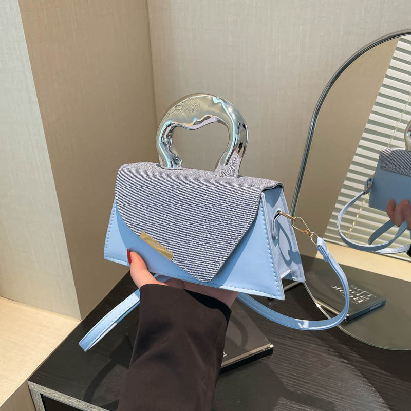 Stylische geometrische strukturierte Handtasche Brehn