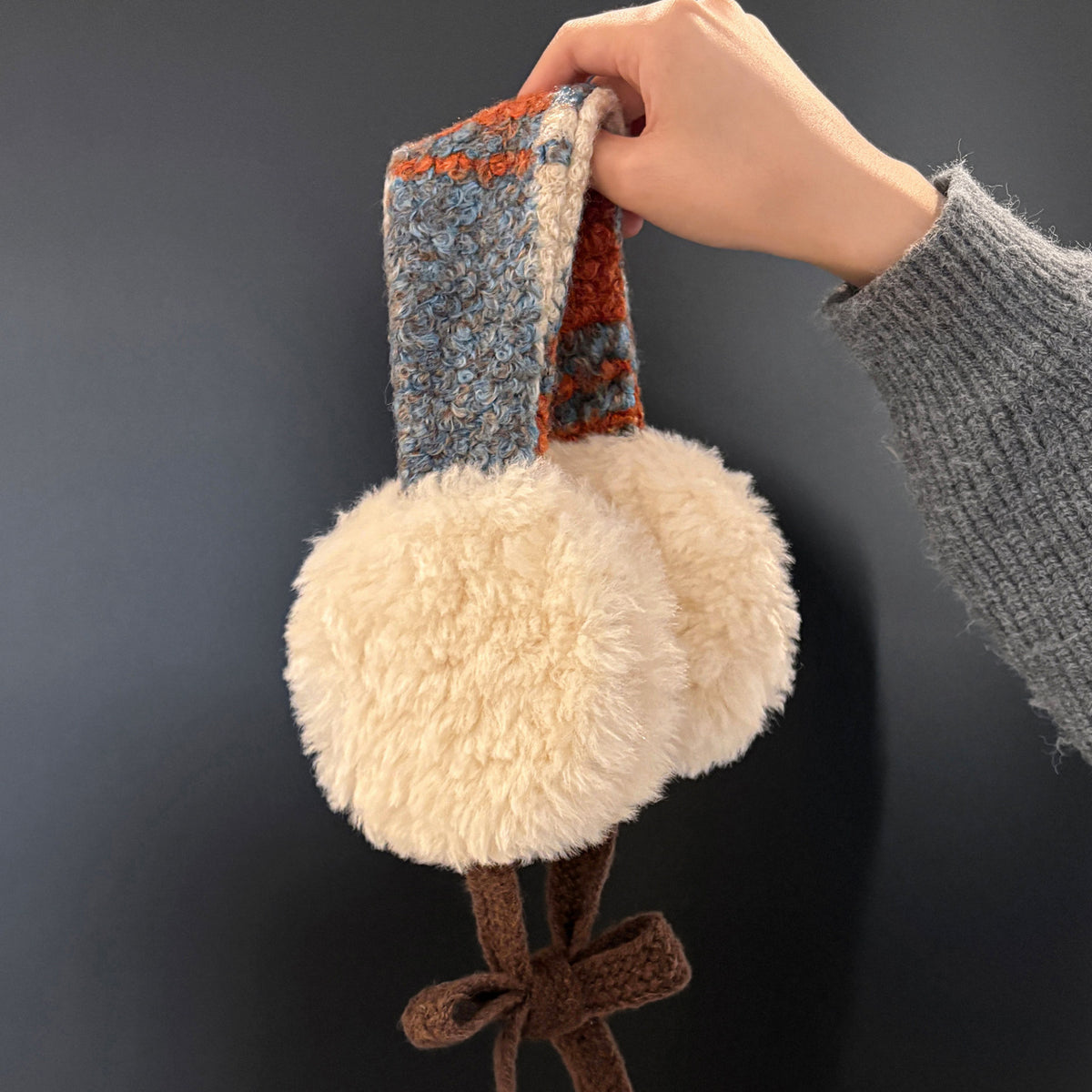 Plüschlockige Kunstfell-Runde Ohrenwärmer mit gemustertem Strickband Brehn