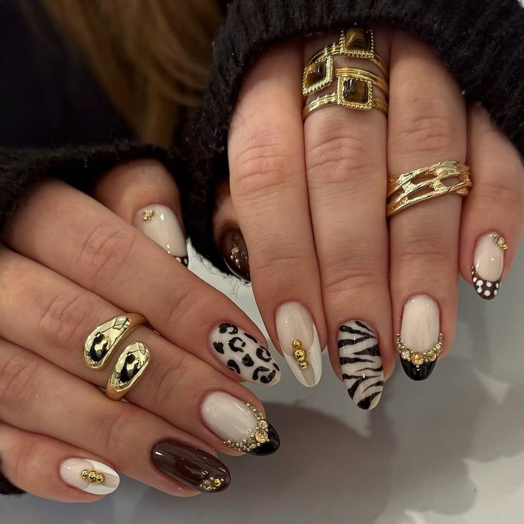 Kunstnagelset mit luxuriösen Tiermotiv-Designs und glamourösen Akzenten Brehn