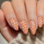 Künstlerisches Press-On Nagelset mit gepunktetem Design Brehn