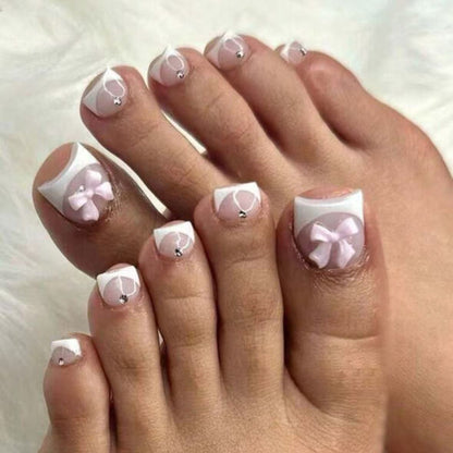 Fußnagelkunstset mit elegantem französischen Design und romantischen Schleifen Brehn