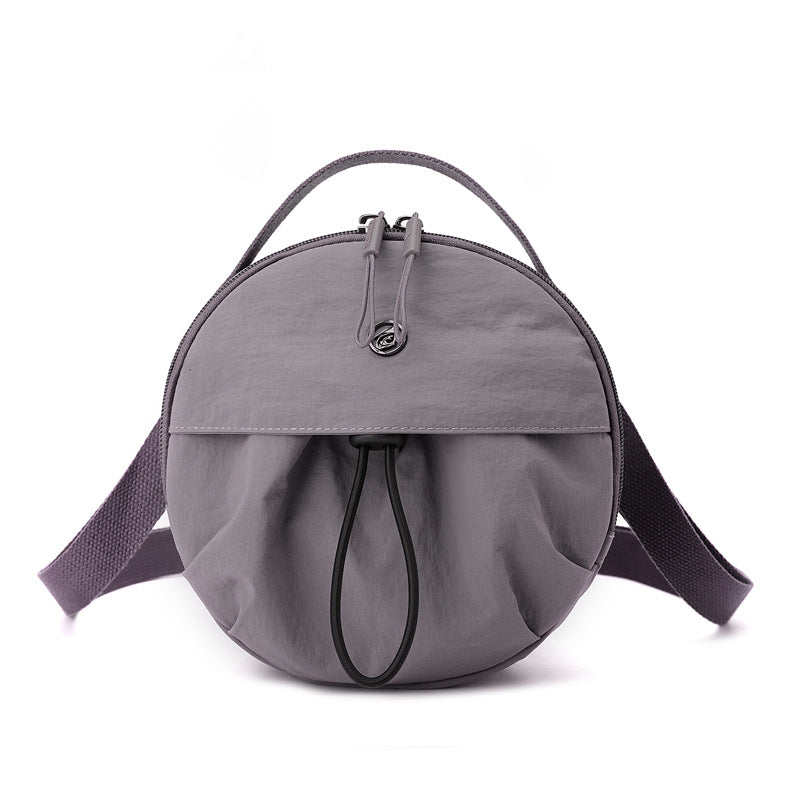 Runde Crossbody-Tasche Brehn