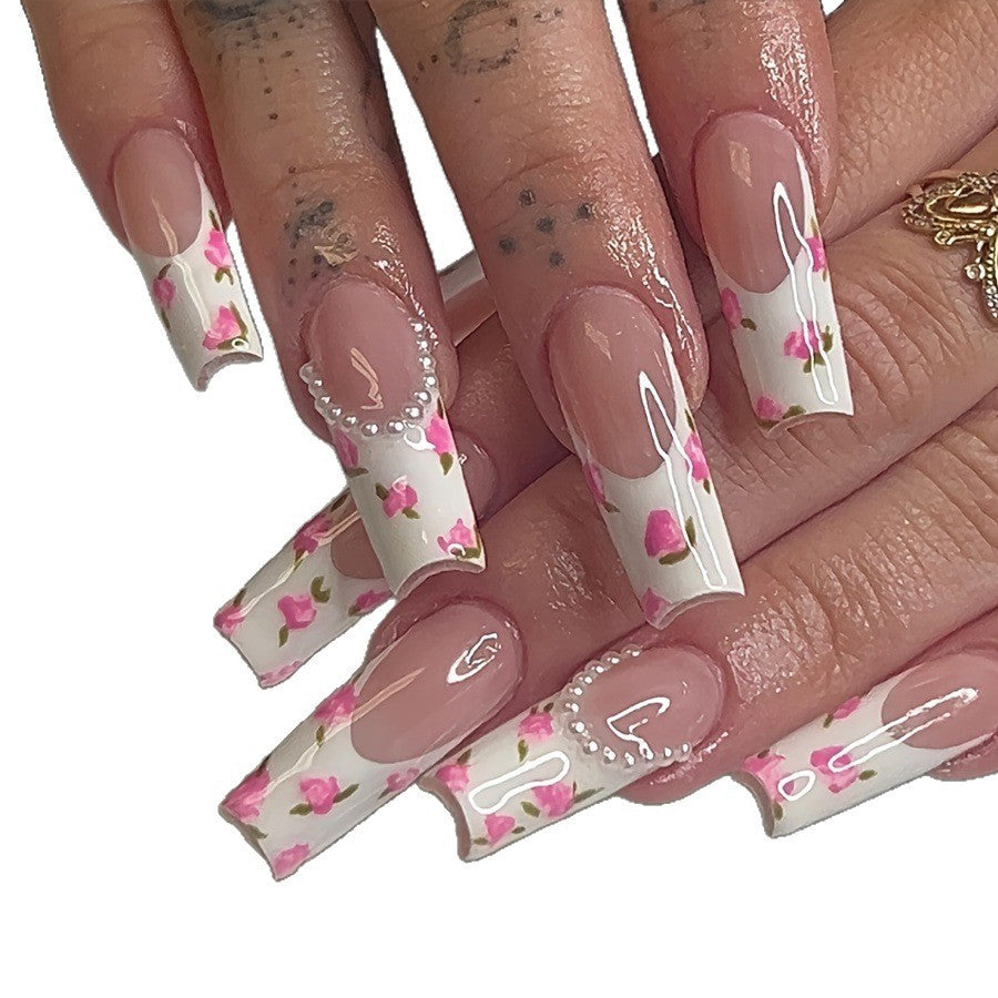 Kunstnagelset mit floralen Designs und eleganten Verzierungen Brehn