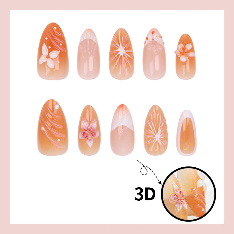 Kunstnagelset mit floralen Akzenten und elegantem Ombre-Effekt Brehn
