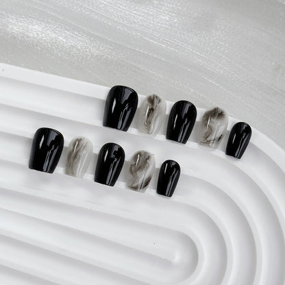 Künstlerisches Gel Press-On Nagelset mit Marmor- und glänzendem Finish