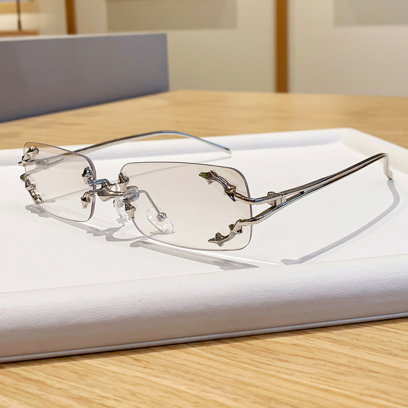 Damen modische Sonnenbrille mit filigranem Metallrahmen und transparenten Gläsern Brehn