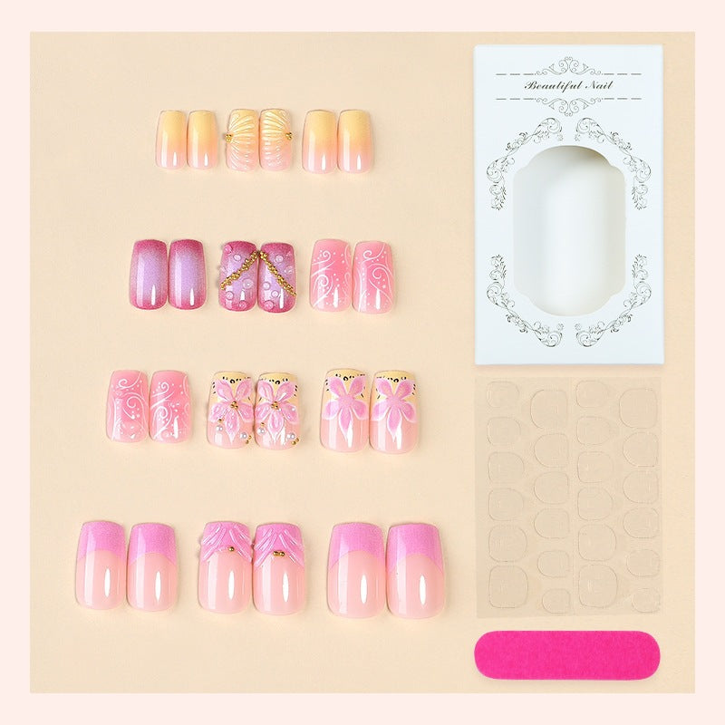 Künstliche Nagelkollektion mit floralem Design und Glitzerakzenten Brehn