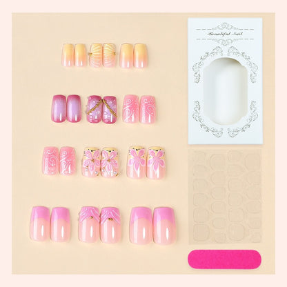 Künstliche Nagelkollektion mit floralem Design und Glitzerakzenten Brehn