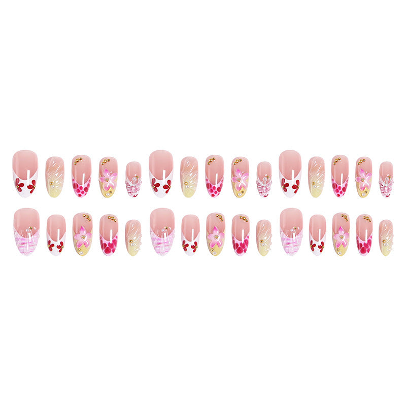 Kunstnagelset mit floralen und glamourösen Dekoren Brehn