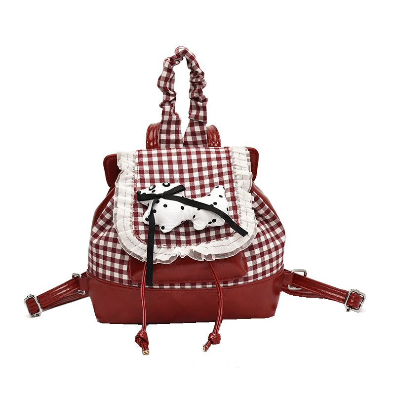 Verspielter Rucksack mit Karomuster und Tierapplikation Brehn