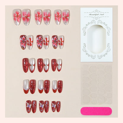Kunstnagelset mit floralen Designs und Glitzerelementen Brehn