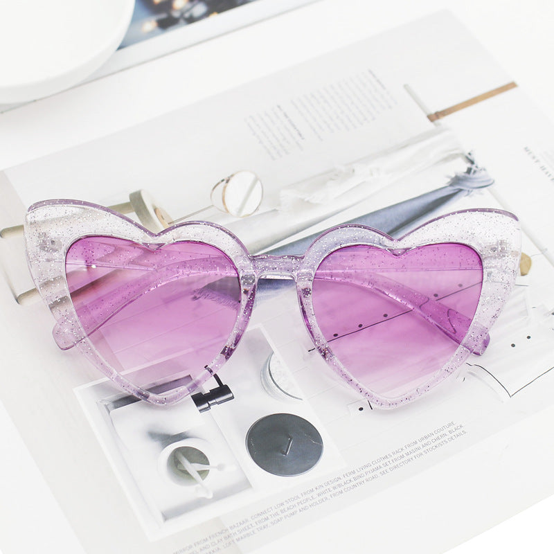 Damen Herzförmige Sonnenbrille mit glitzerndem Rahmen Brehn