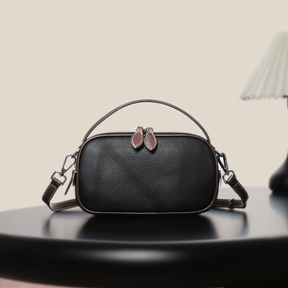 Strukturierte genarbte Leder-Top-Handle-Crossbody-Tasche mit abnehmbarem Riemen
