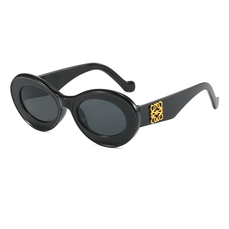 Damen modische Sonnenbrille mit ovalem Rahmen und goldenen Applikationen Brehn