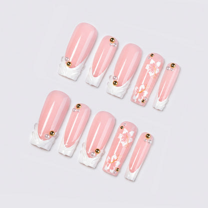Kunstnagelset mit kunstvollen Blütenmotiven Brehn