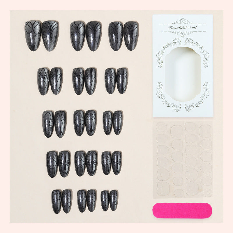 Dekorativer Presse-on-Nagelset mit künstlerischem Spinnendesign Brehn
