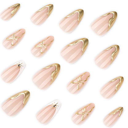 Kunstvolle Stiletto-Nägel mit eleganten Goldakzenten Brehn