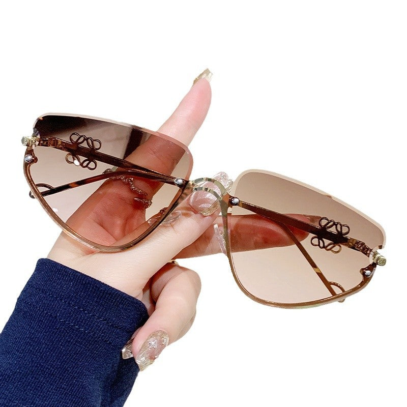 Damen extravagante Sonnenbrille mit modernem, geometrischem Rahmen Brehn