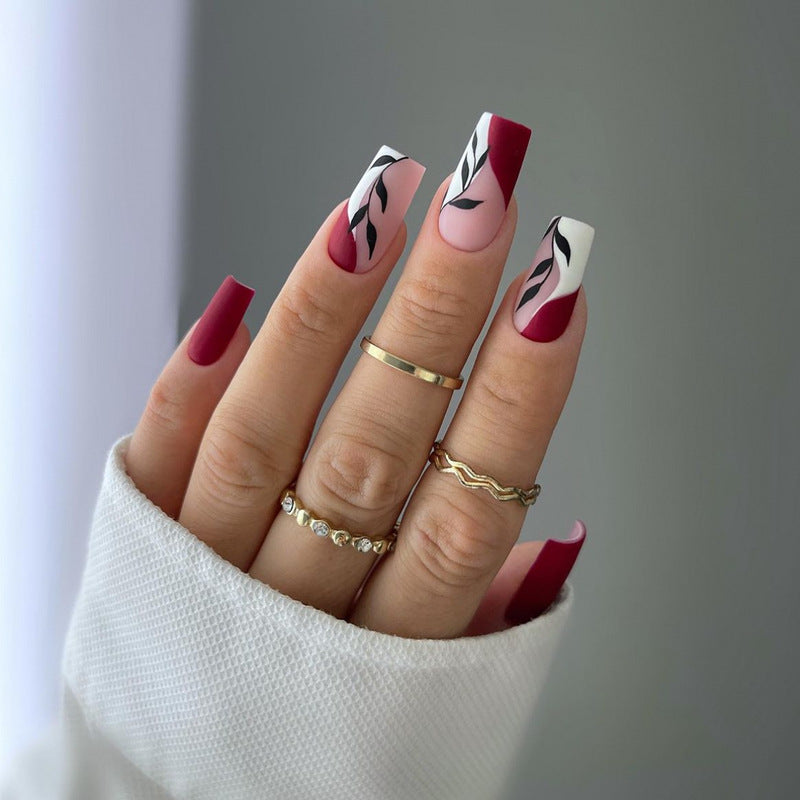 Elegante Stiletto Press-On Nagelkunst mit Strass-Akzenten Brehn