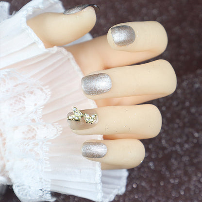 Glitzerndes Press-On-Nagelkunst-Set mit eleganten Schmetterlingsakzenten Brehn