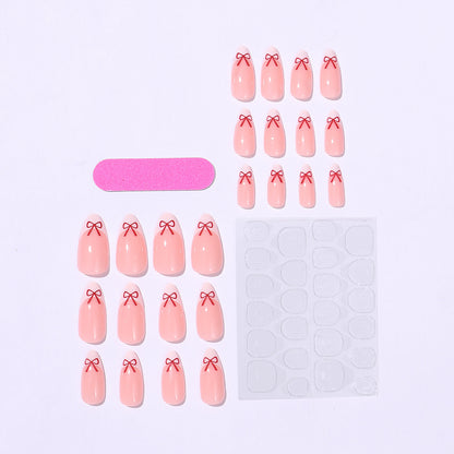 Kunstnagelset mit verspieltem Schleifen-Design Brehn