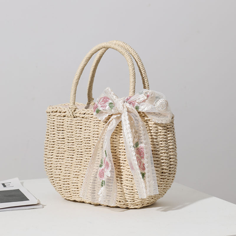 Elegante Basttasche mit Floralem Schleifendetail Brehn