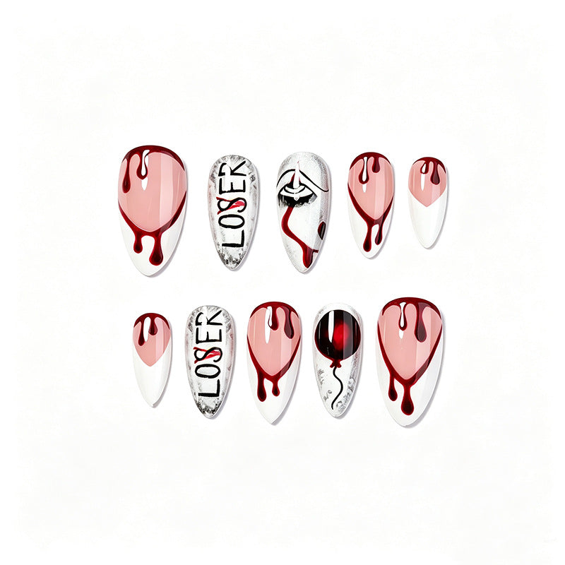 Kreatives Kunstnagelset mit blutigen und gruseligen Designs Brehn