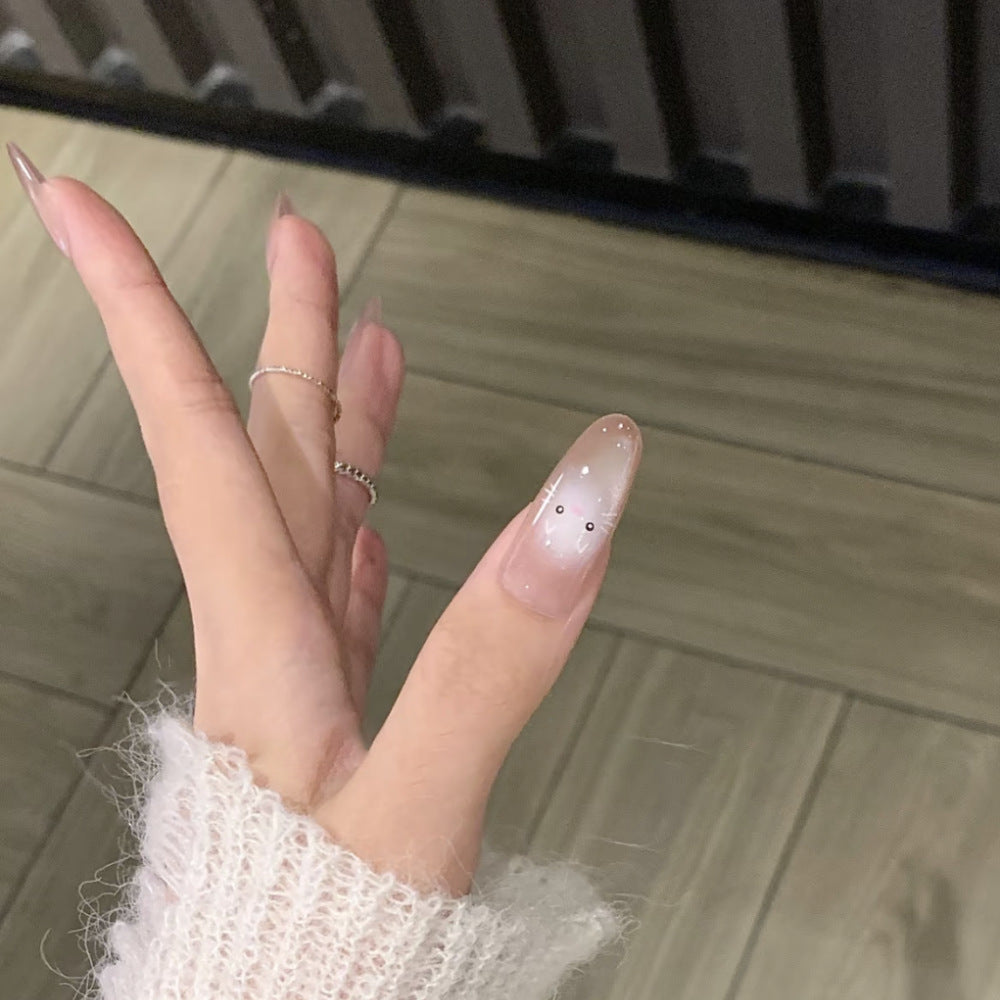 Künstlerisches Press-On-Nagelset mit verspielten Tierdesigns Brehn