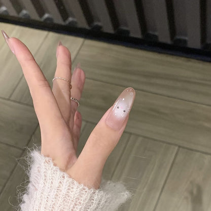 Künstlerisches Press-On-Nagelset mit verspielten Tiermotiven Brehn