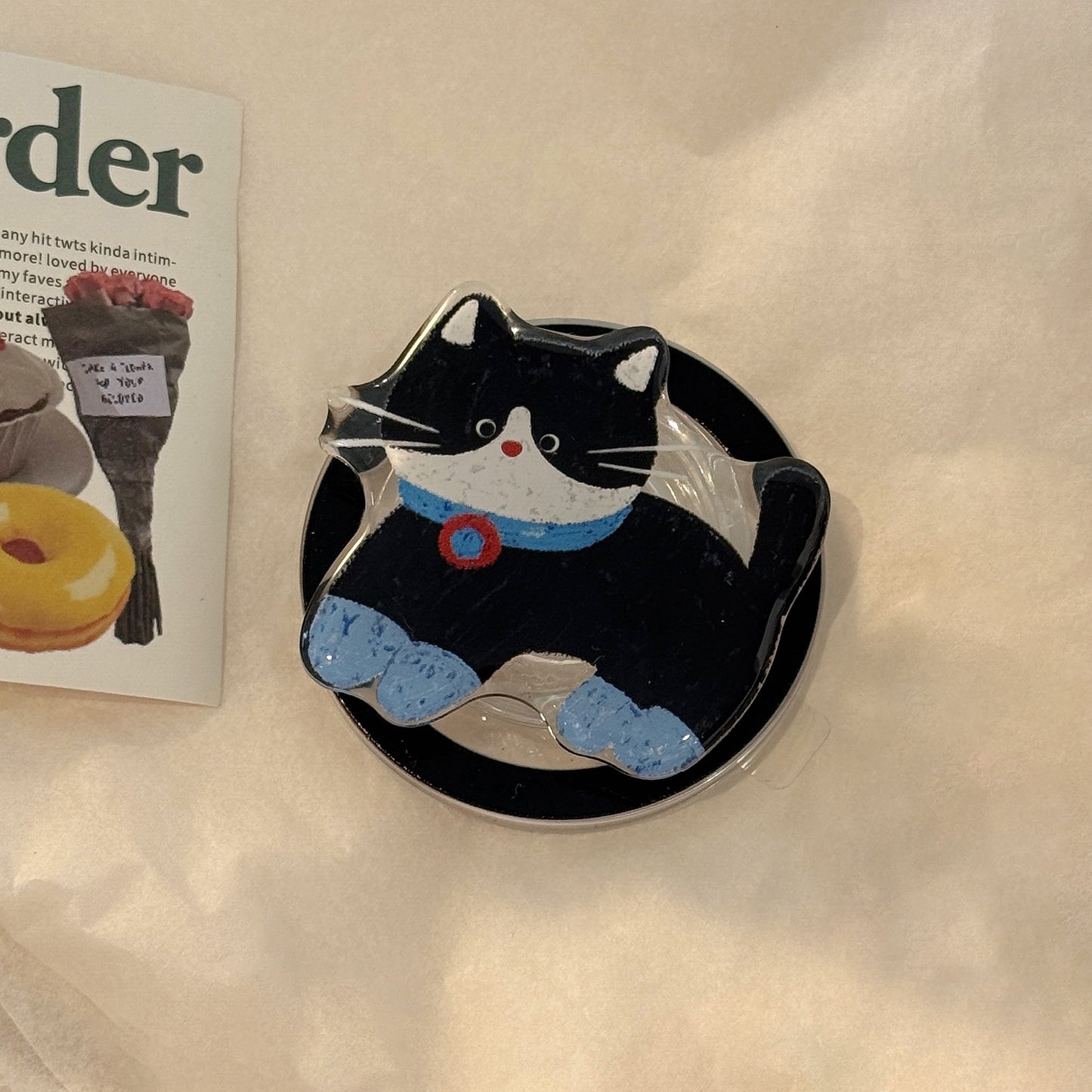 Verspielter Katzenmotiv Smartphone Fingerhalter Brehn