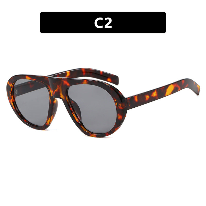Damen auffällige Sonnenbrille mit futuristischem Rahmen und robustem Design Brehn