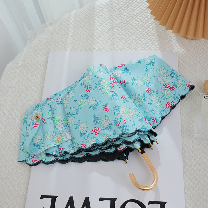 Damen eleganter Automatischer Faltregenschirm mit floralen Details Brehn