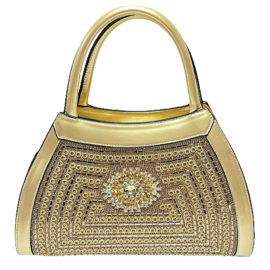 Verzierte gepolsterte Abendhandtasche