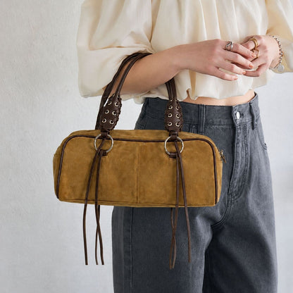 Luxuriöse Lederhandtasche mit geflochtenen Trägern