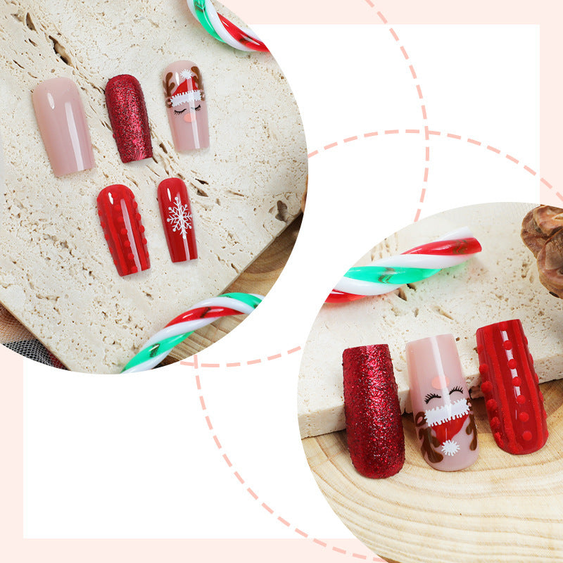 Kunstnagelset mit festlichen Weihnachtsmotiven und Glitzerakzenten Brehn