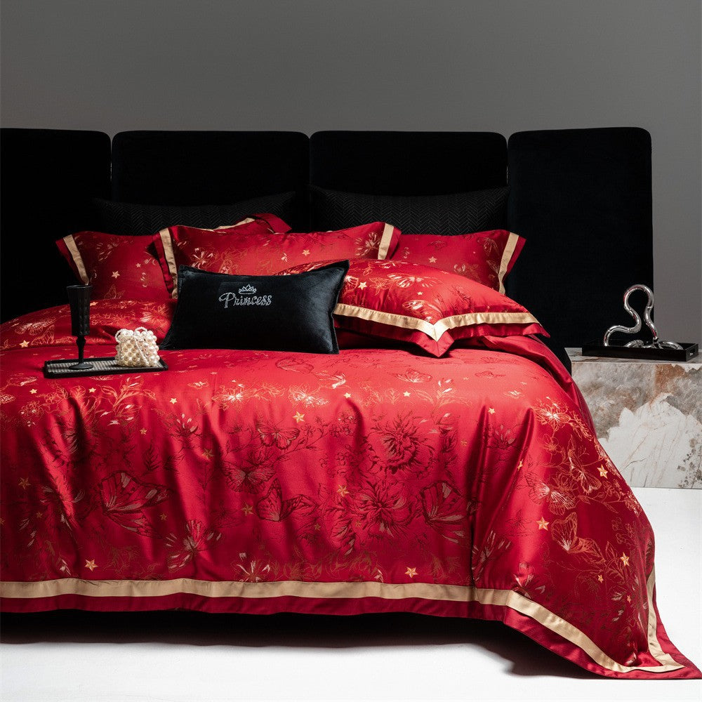 Opulente Satin-Bettwäschegarnitur mit Jacquard‑Blumenmotiv und goldveredelter Zierkante