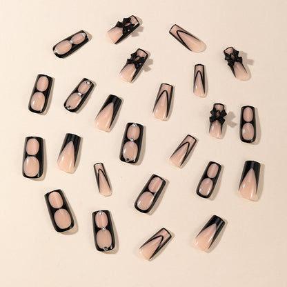 Elegante Stiletto-Nagelkunstverlängerungen mit Schleifenakzenten Brehn
