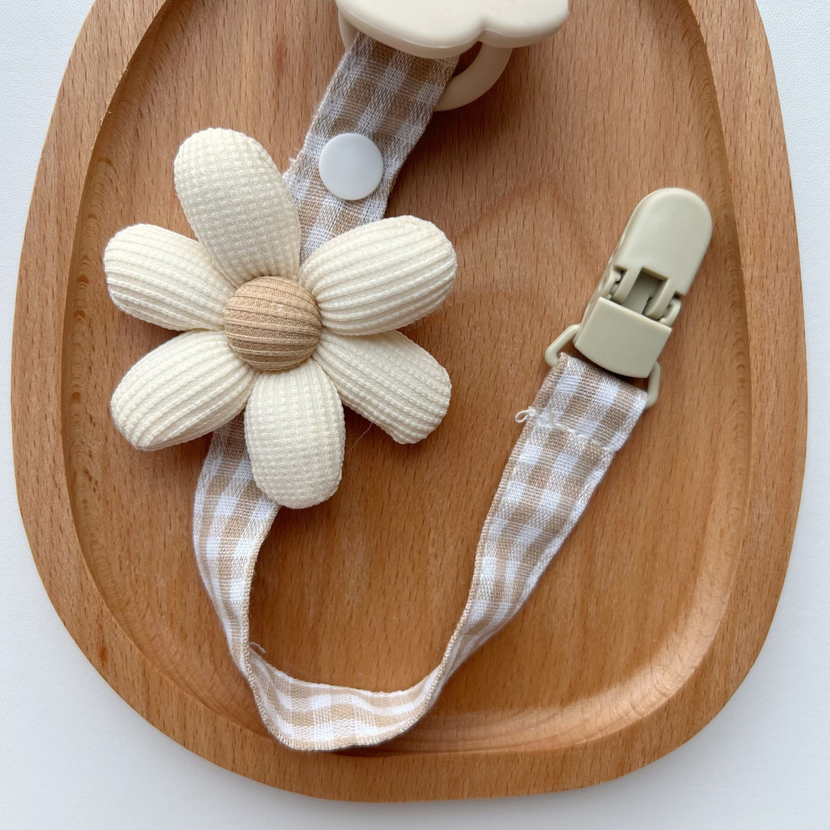 Blumenkleidungs-Schnullerclip mit Gingham-Baumwollgurt