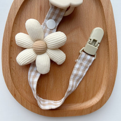 Blumenkleidungs-Schnullerclip mit Gingham-Baumwollgurt