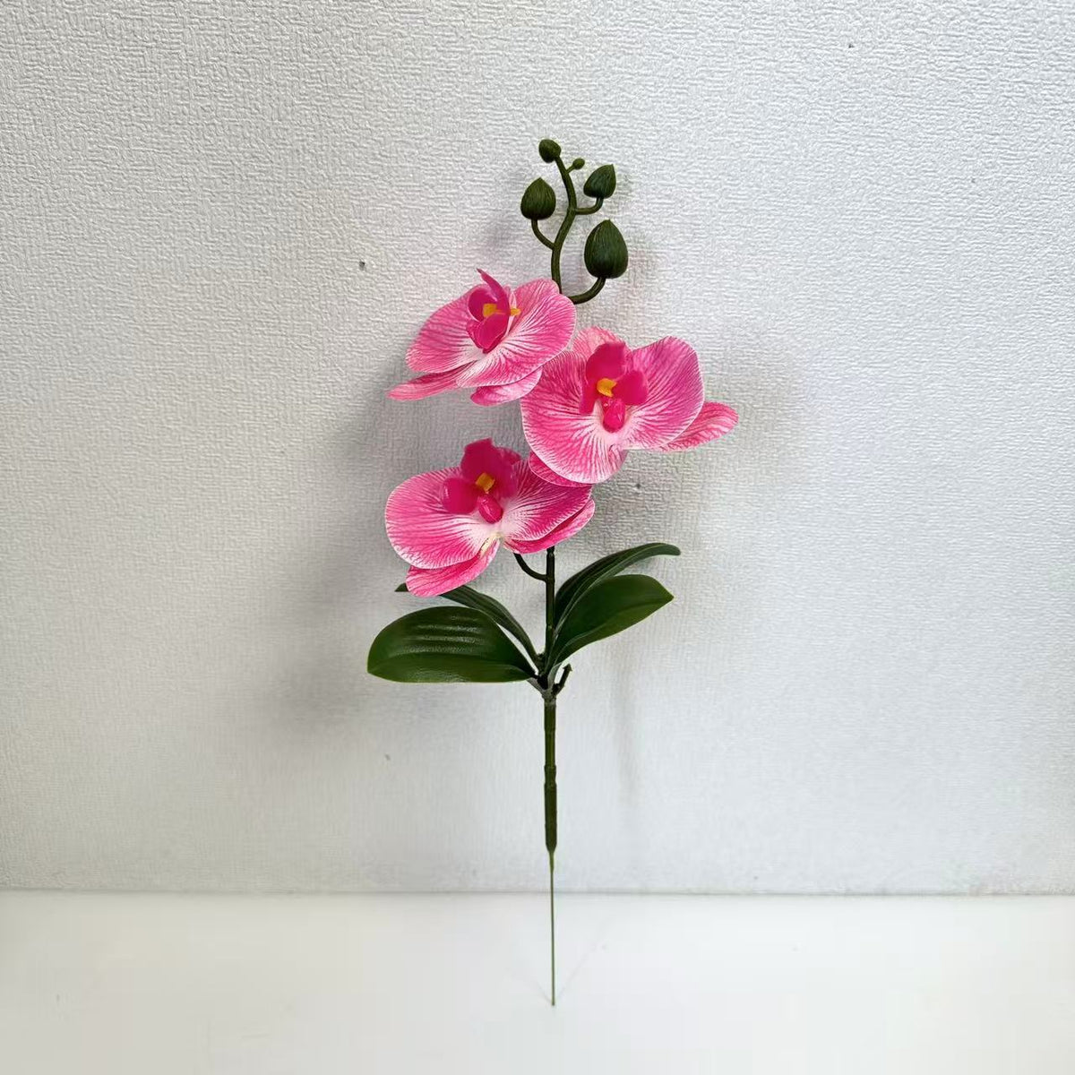 Künstliches Orchideenblütenarrangement für dekorative Wohnraumausstellung