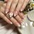 Elegante mit Schleifen geschmückte Press-On Nagelspitzen Brehn