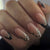 Stiletto Press-On-Nagelset mit kreativem Leoparden- und glänzenden schwarzen Akzenten Brehn
