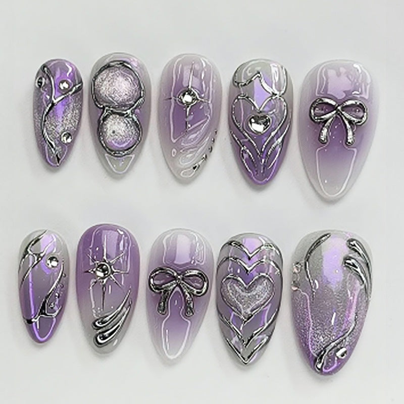 Kunstnagelset mit elegantem Ombre-Design und filigranen Verzierungen Brehn