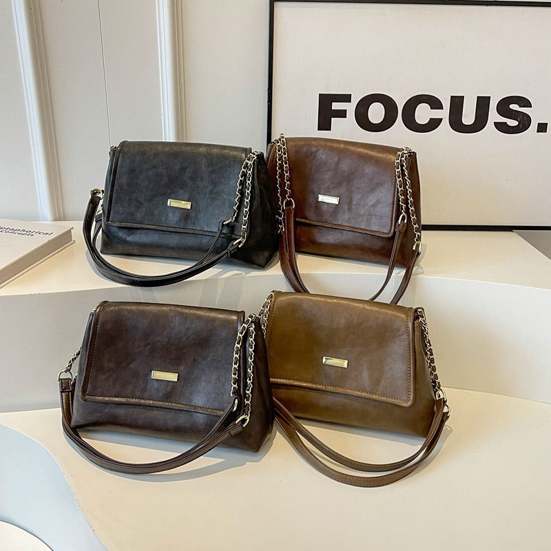 Kettengriff Handtasche