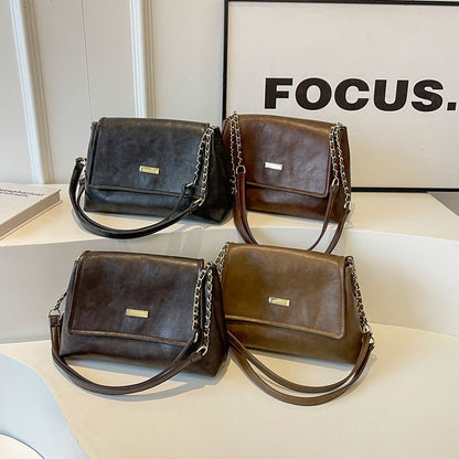 Kettengriff Handtasche