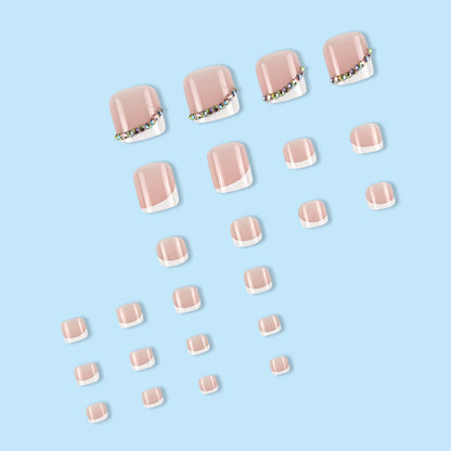 Fußnagelkunst Set mit eleganten französischen Spitzen und Glitzerakzenten Brehn