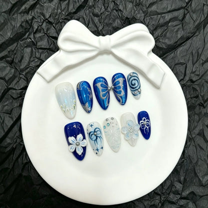 Dekorative Schmetterlings Press-On Nagelkunst Kollektion