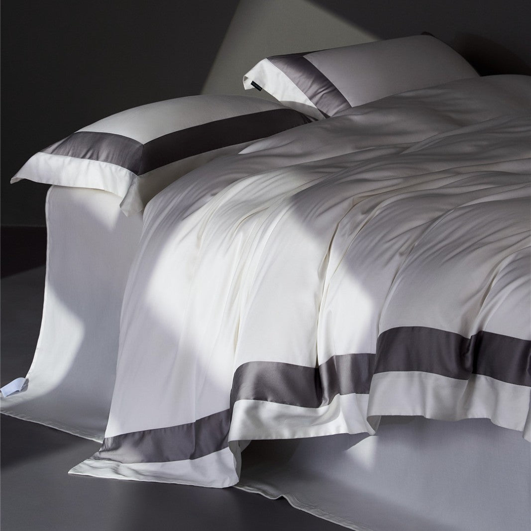 Luxuriöses Satin Bettbezug Set mit kontrastiertem Rand und Kissenbezügen
