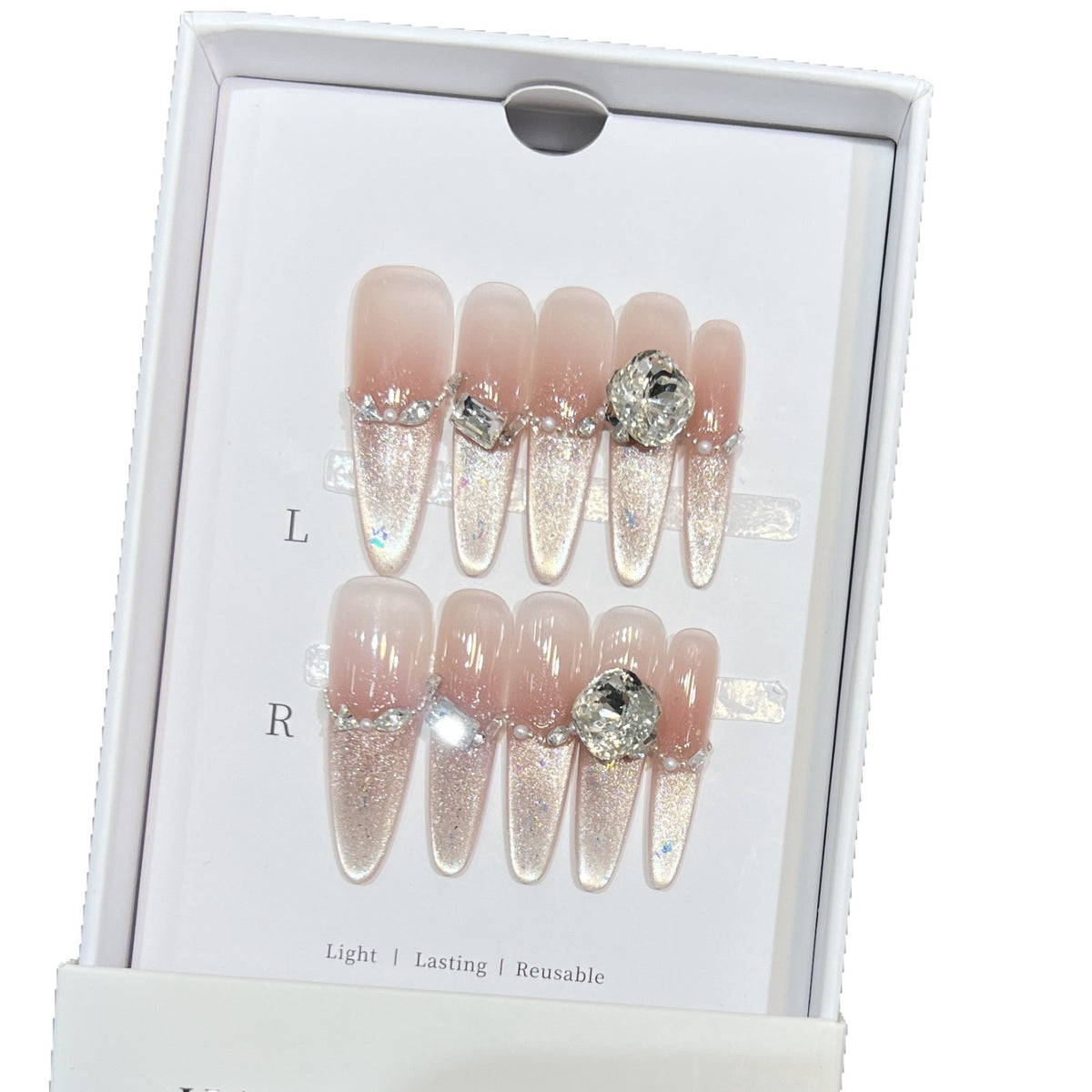 Dekorativer Stiletto Press-On Nagelkunstset mit Strassdetails Brehn
